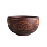 Close-up of Animal Motifs on Wooden Bowl